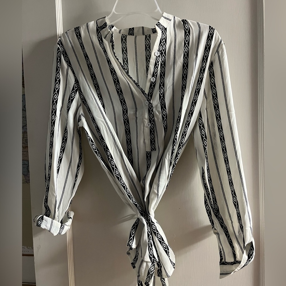 Black and white long sleeve blouse. Worn once.